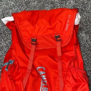 Reddish/Orange Camelbak Arête 18 daypack